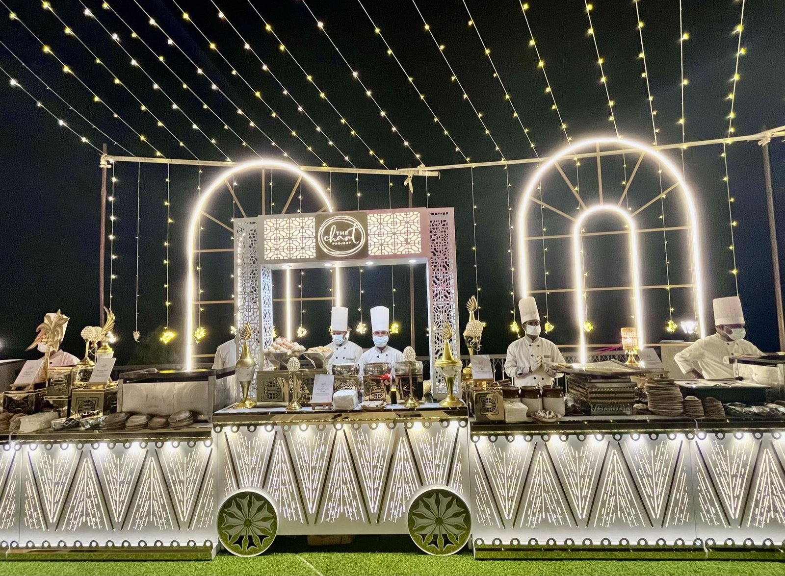 Live counter catering beneath a canopy of lights at Parv Vilas, ITC WelcomHeritage